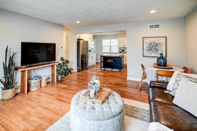 living room featuring light hardwood / wood-style flooring