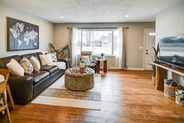 living room featuring light wood-type flooring