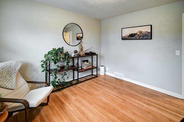 living area featuring wood-type flooring