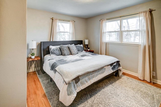 bedroom featuring hardwood / wood-style floors