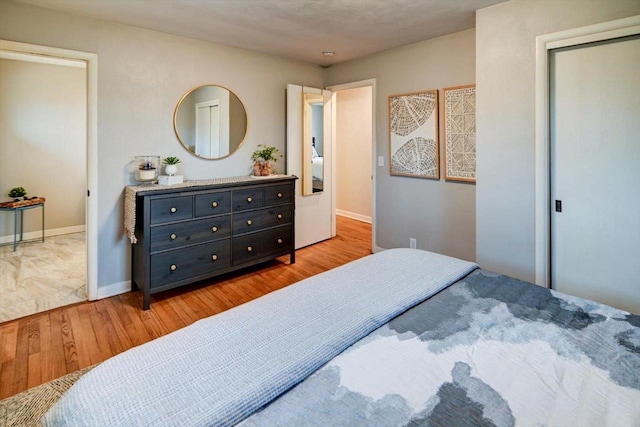 bedroom featuring light wood-type flooring