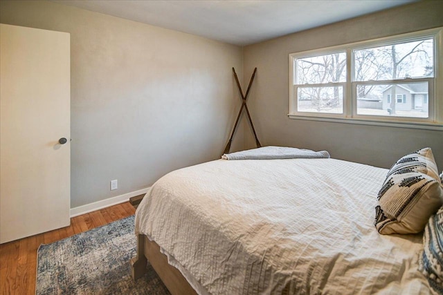 bedroom featuring hardwood / wood-style flooring