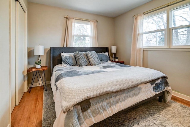 bedroom with light wood-type flooring