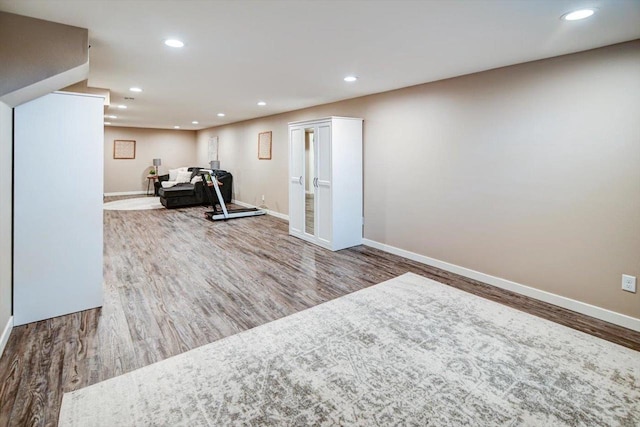 exercise area with hardwood / wood-style floors