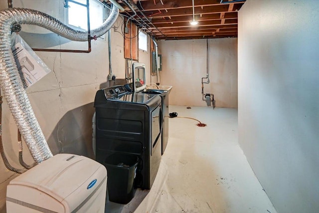 basement with washer and clothes dryer