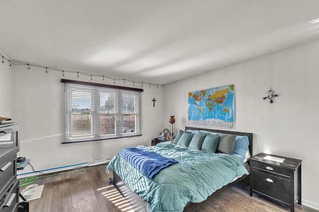 bedroom featuring dark hardwood / wood-style floors