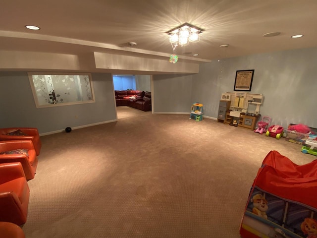 recreation room featuring carpet flooring