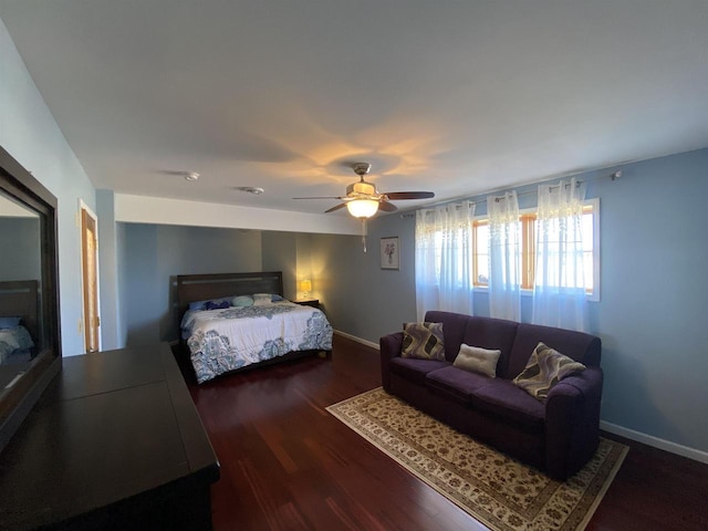 bedroom featuring dark wood-type flooring and ceiling fan