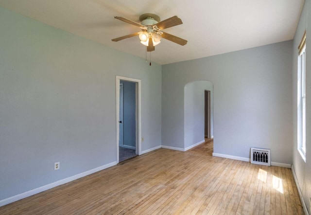 unfurnished room with ceiling fan and light hardwood / wood-style floors