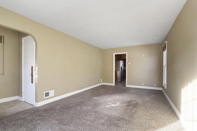 unfurnished room with carpet