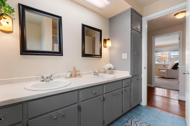 bathroom featuring vanity and tile patterned flooring