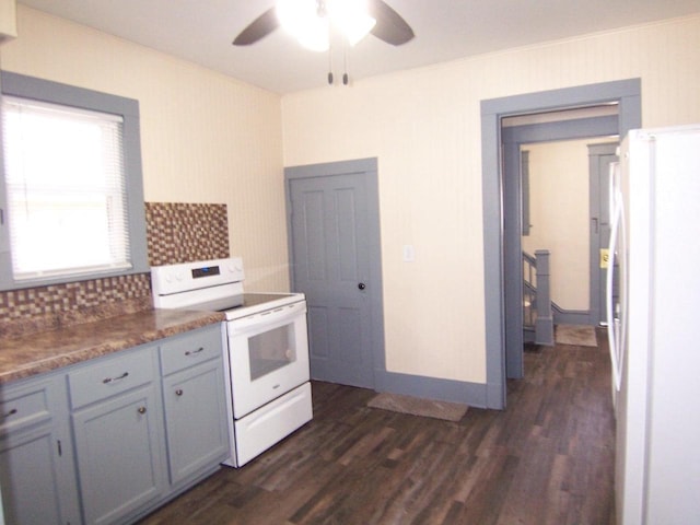 kitchen with white appliances, ornamental molding, dark hardwood / wood-style floors, gray cabinets, and ceiling fan