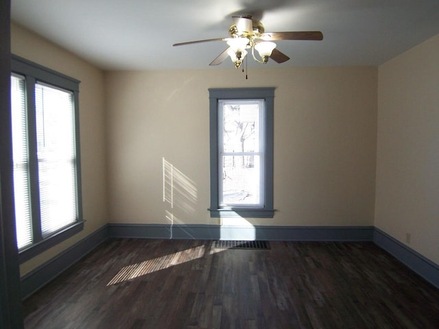 empty room featuring dark hardwood / wood-style floors