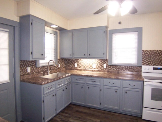 kitchen with sink, white electric range, gray cabinets, and decorative backsplash