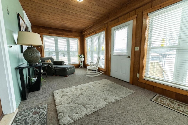 sunroom / solarium featuring wood ceiling