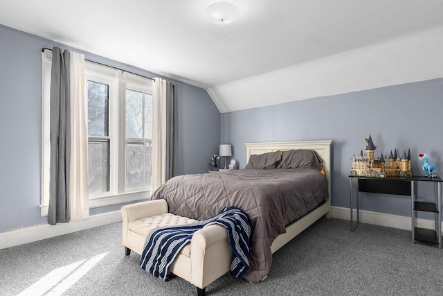 carpeted bedroom with vaulted ceiling