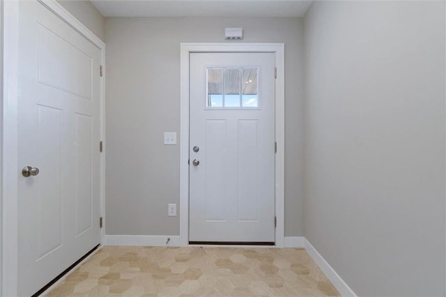 entrance foyer with baseboards