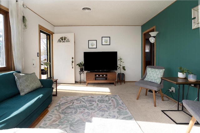 living room with light colored carpet