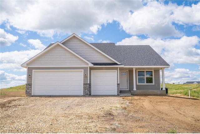 craftsman-style home with a garage