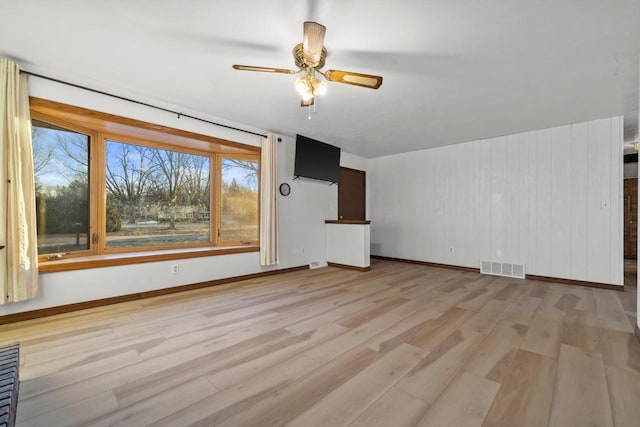 bonus room featuring light hardwood / wood-style floors and ceiling fan