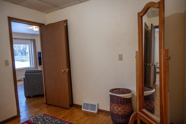 hall with light hardwood / wood-style floors