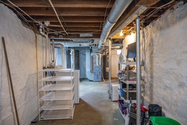 basement with heating unit and water heater