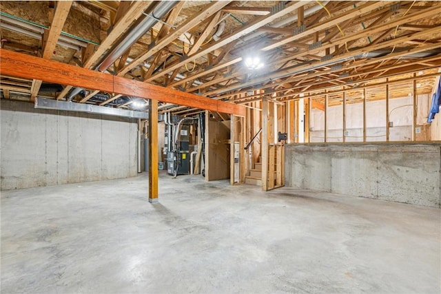 basement featuring heating unit