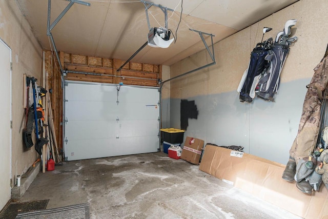 garage featuring a garage door opener