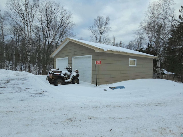 13770 State Highway 13, Herbster, WI 54844 - view of snow covered garage