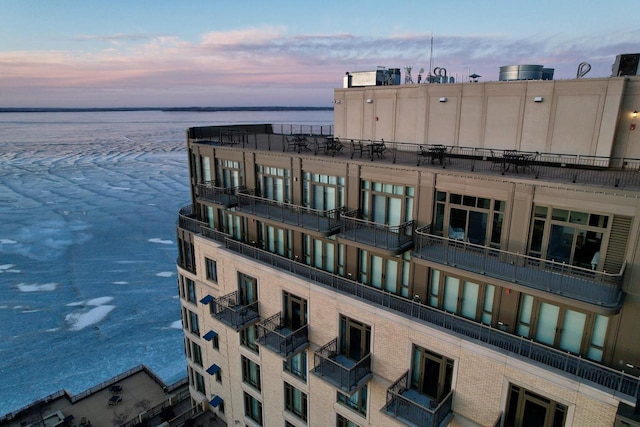 outdoor building at dusk with a water view