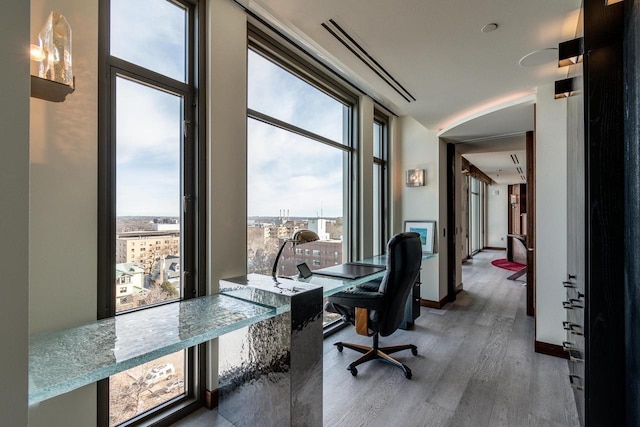 home office featuring hardwood / wood-style floors