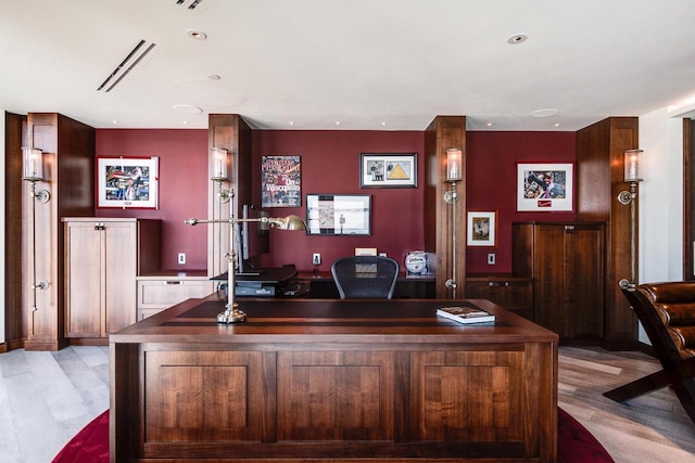 office with light hardwood / wood-style flooring