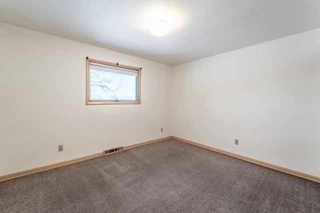 unfurnished room with carpet flooring