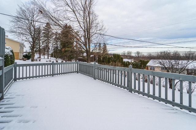 view of snow covered deck