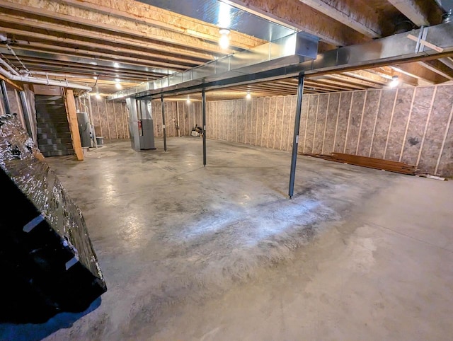 basement featuring heating unit