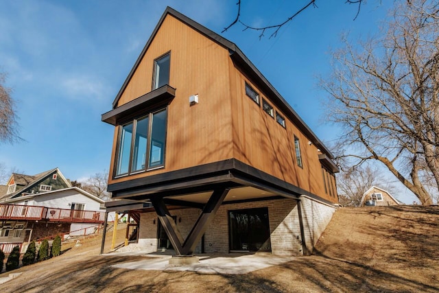 back of property with a patio