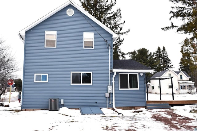 view of snow covered house