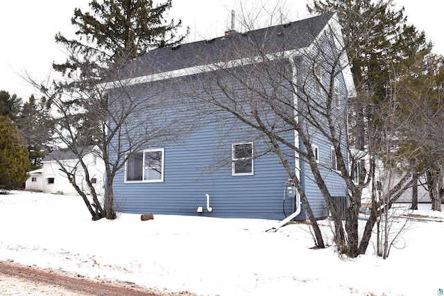 view of snow covered property