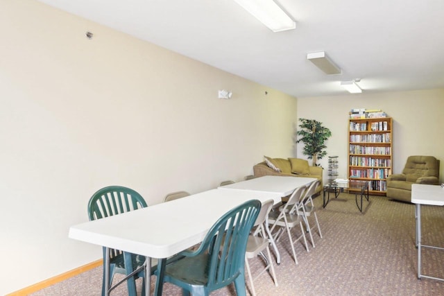 view of carpeted dining area