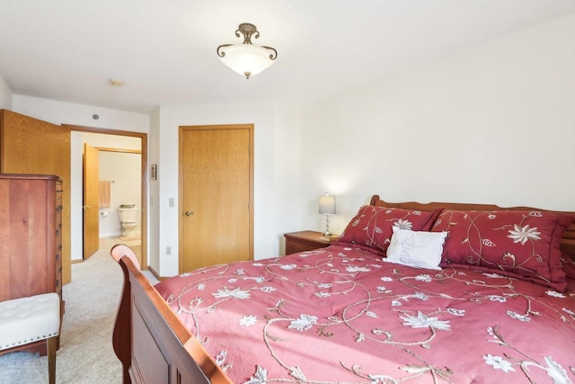 carpeted bedroom featuring a closet