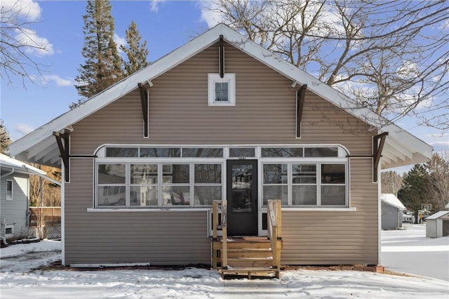 view of snow covered property