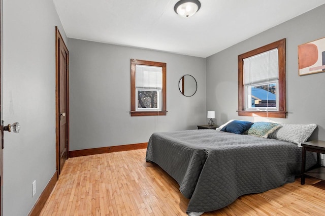 bedroom with light hardwood / wood-style flooring