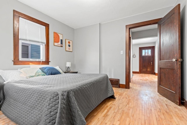 bedroom with light hardwood / wood-style flooring