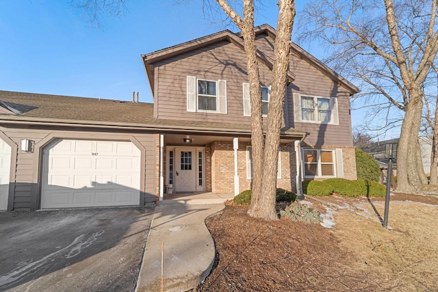 front facade with a garage