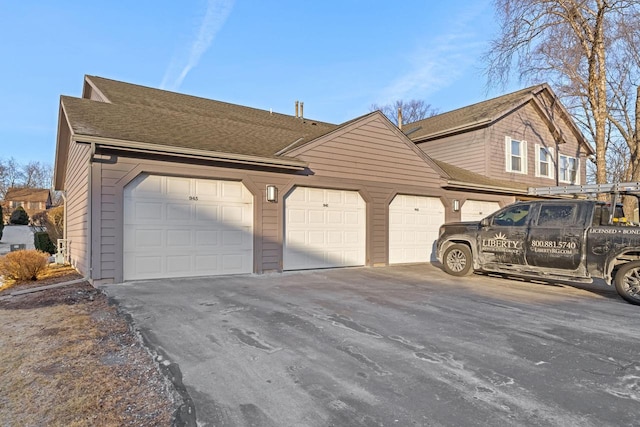 exterior space with a garage