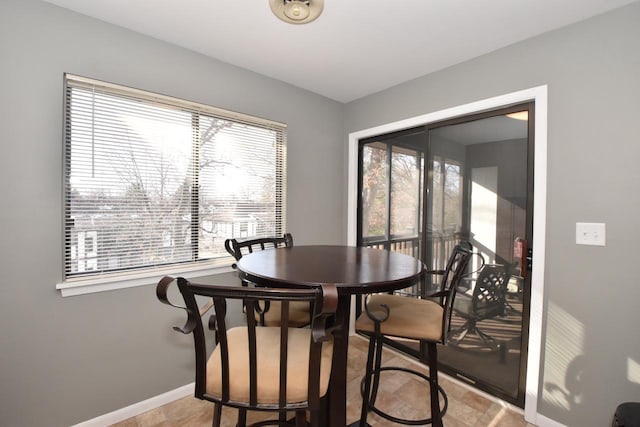 dining room featuring light tile patterned floors