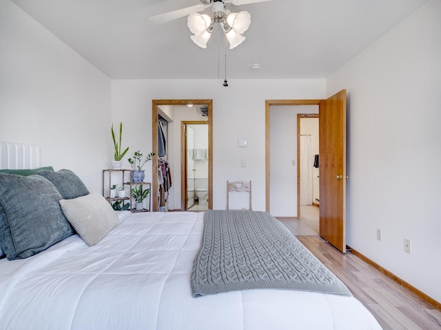 bedroom with ceiling fan and light hardwood / wood-style flooring