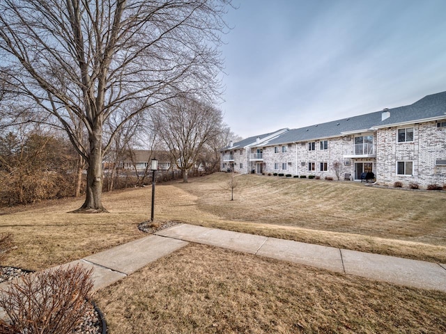 view of community with a yard