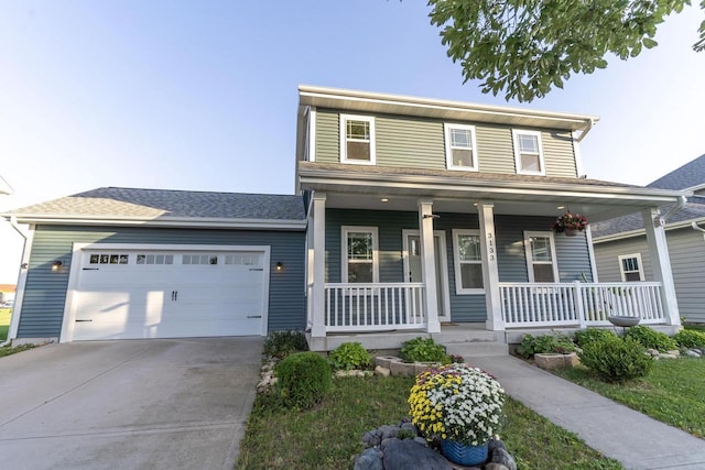 view of front of house with a garage and covered porch