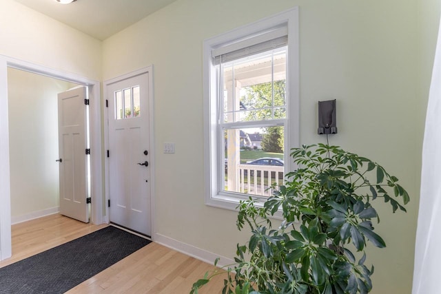 foyer with light wood-type flooring